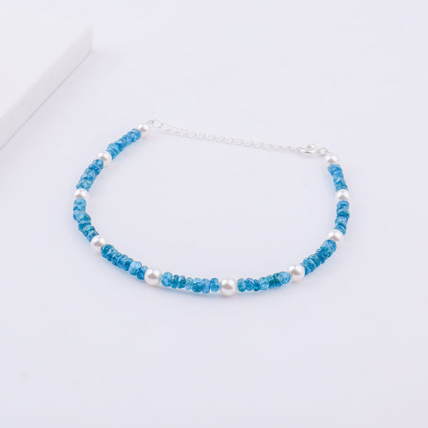 Silver chain extension of anklet with blue beads and pearls
