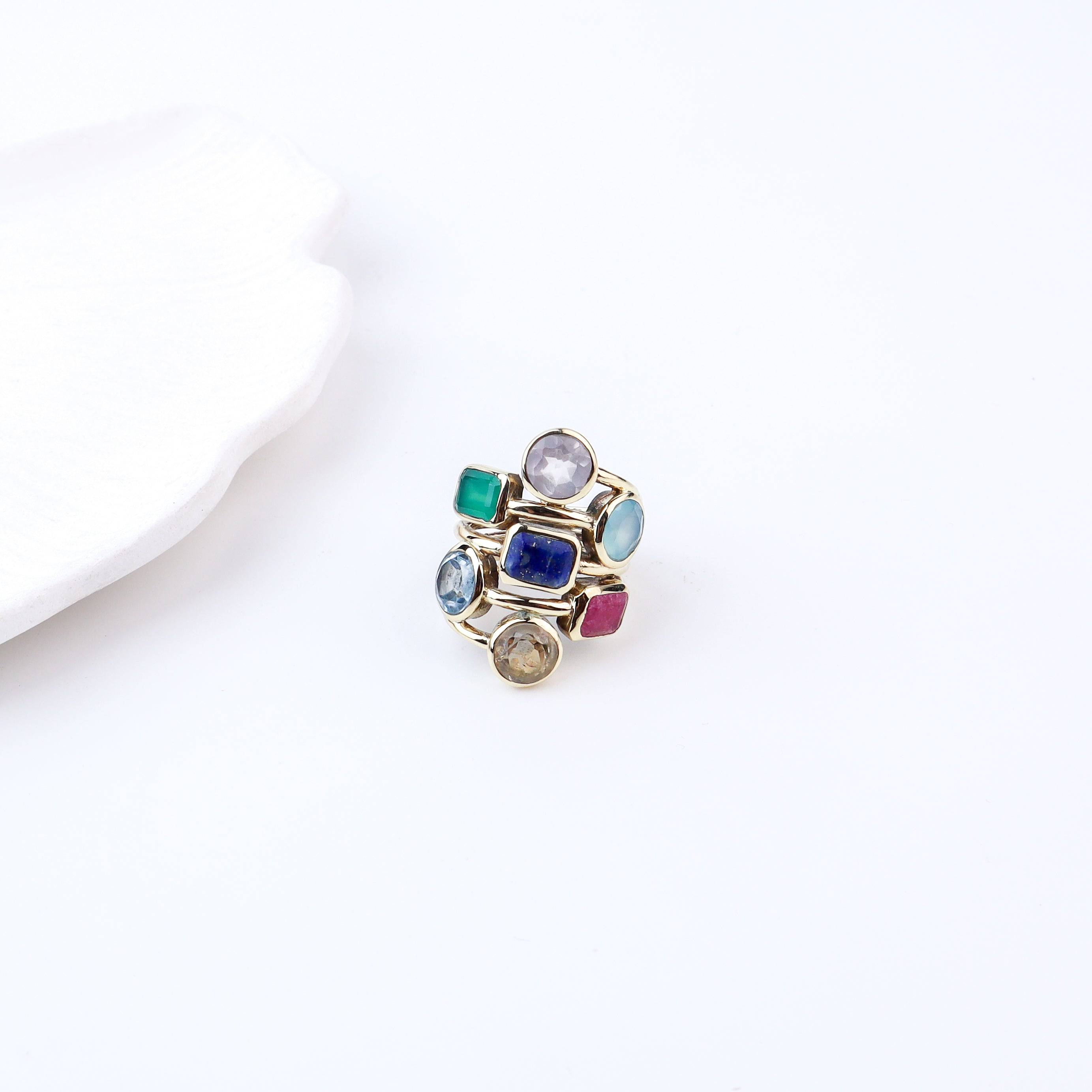 Angled view of Brass Fashion Ring highlighting its distinctive shape, structure, and elegant brass finish