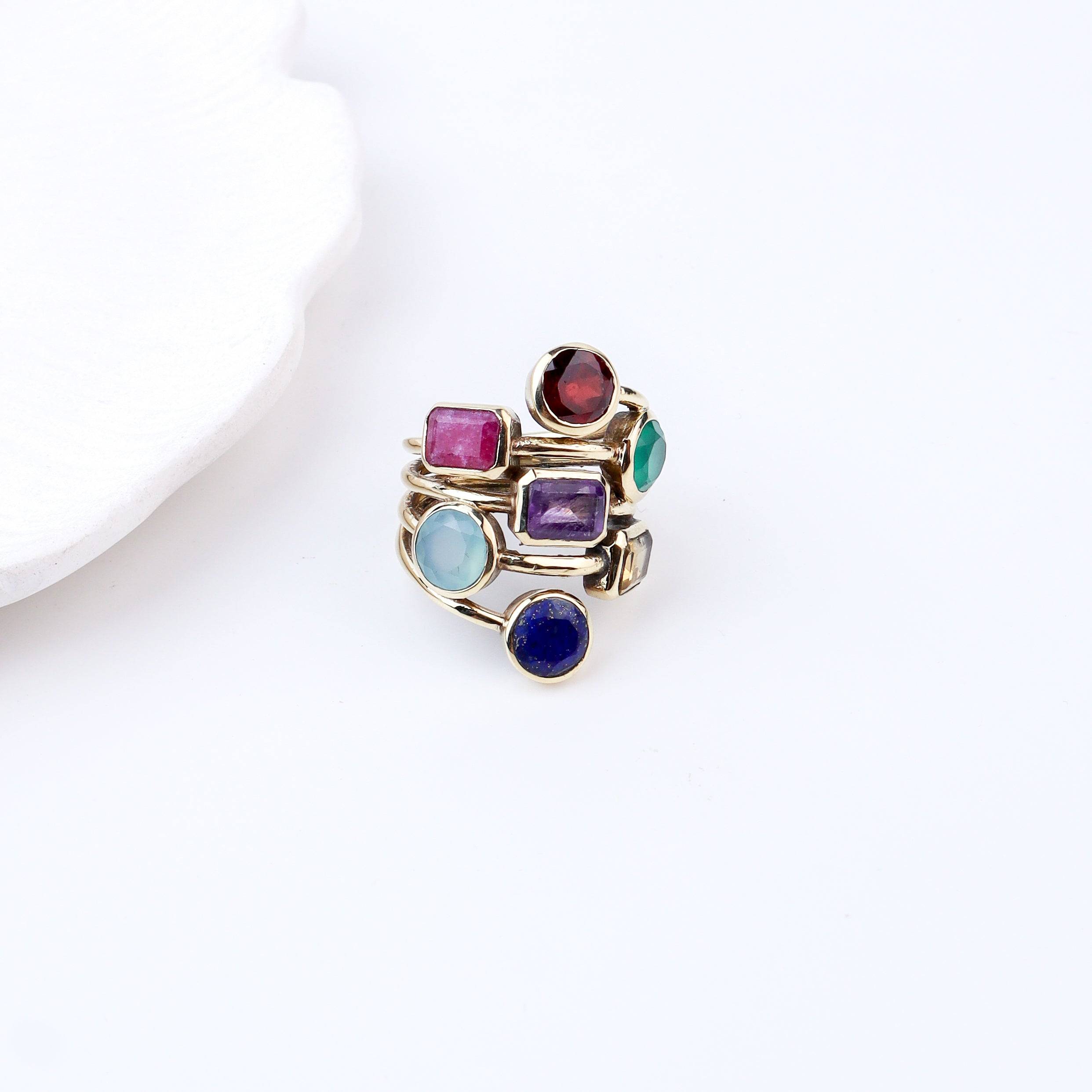 Angled view of Brass Fashion Ring highlighting its distinctive shape, structure, and elegant brass finish