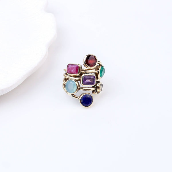 Angled view of Brass Fashion Ring highlighting its distinctive shape, structure, and elegant brass finish