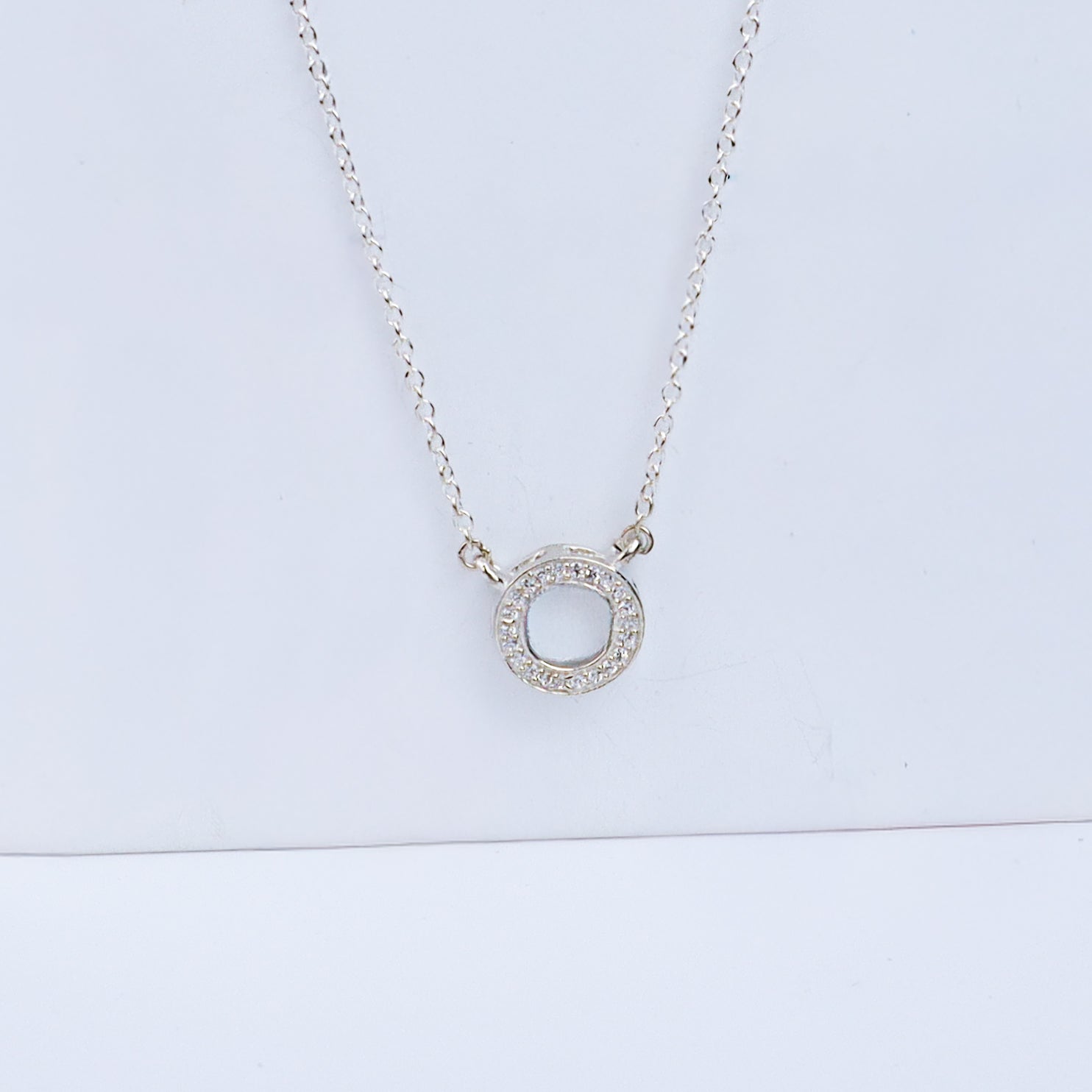 Handcrafted silver circle CZ pendant polished finish
