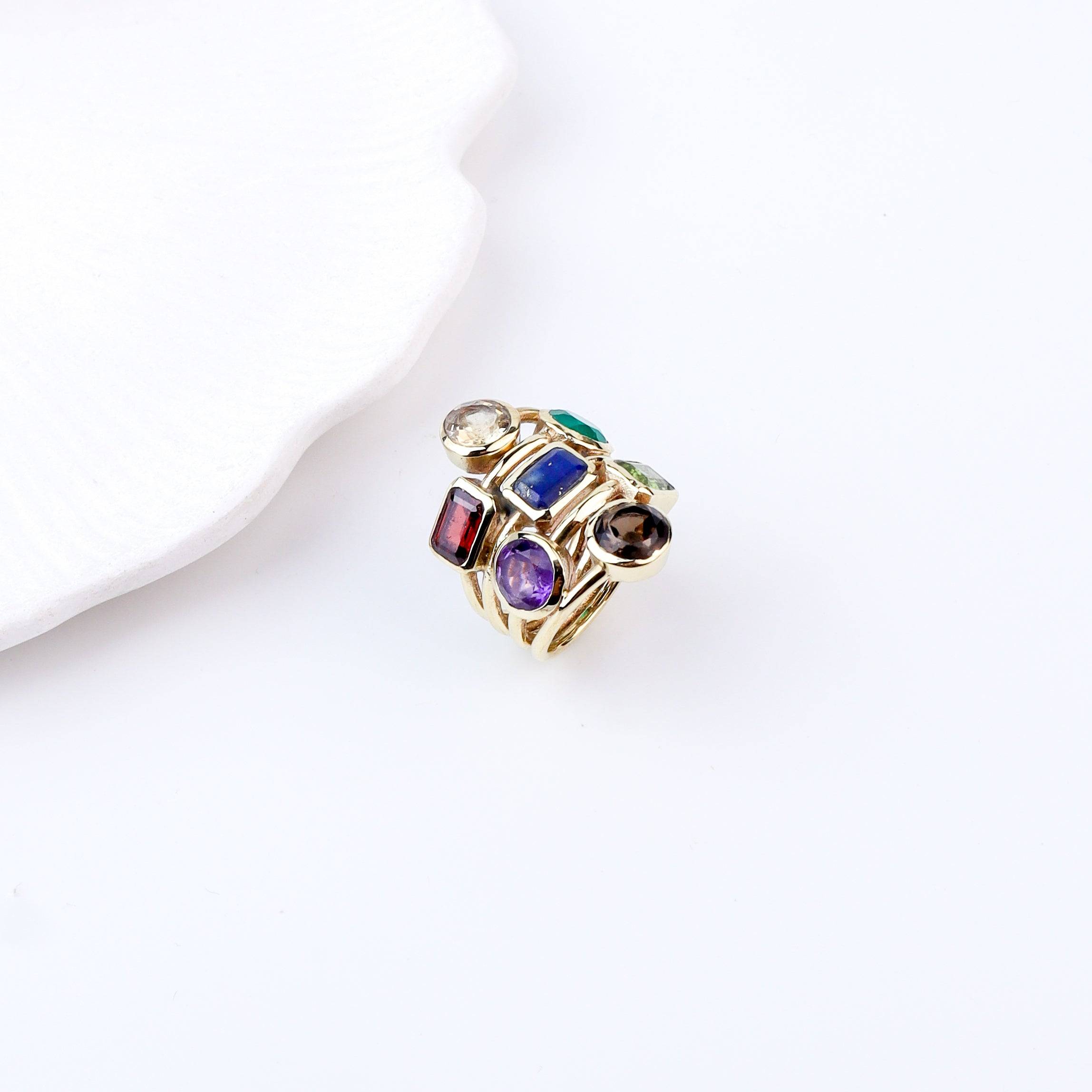 Flat-lay of Brass Fashion Ring with complementary jewellery and accessories for a chic styling setup