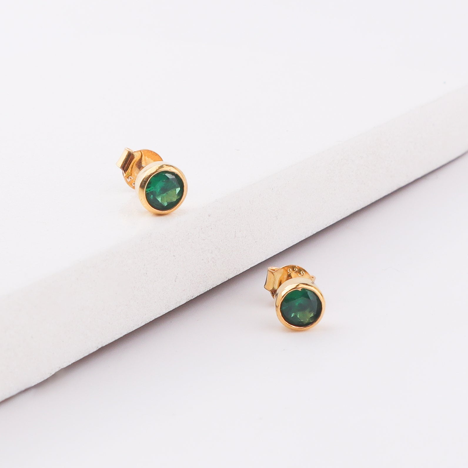 Green gemstone stud earrings