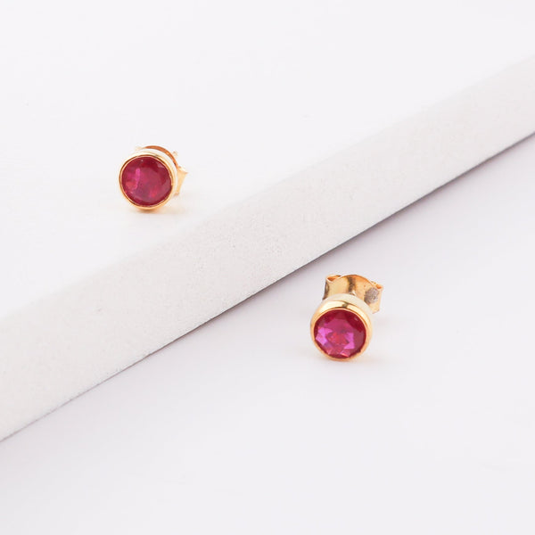Red gemstone stud earrings