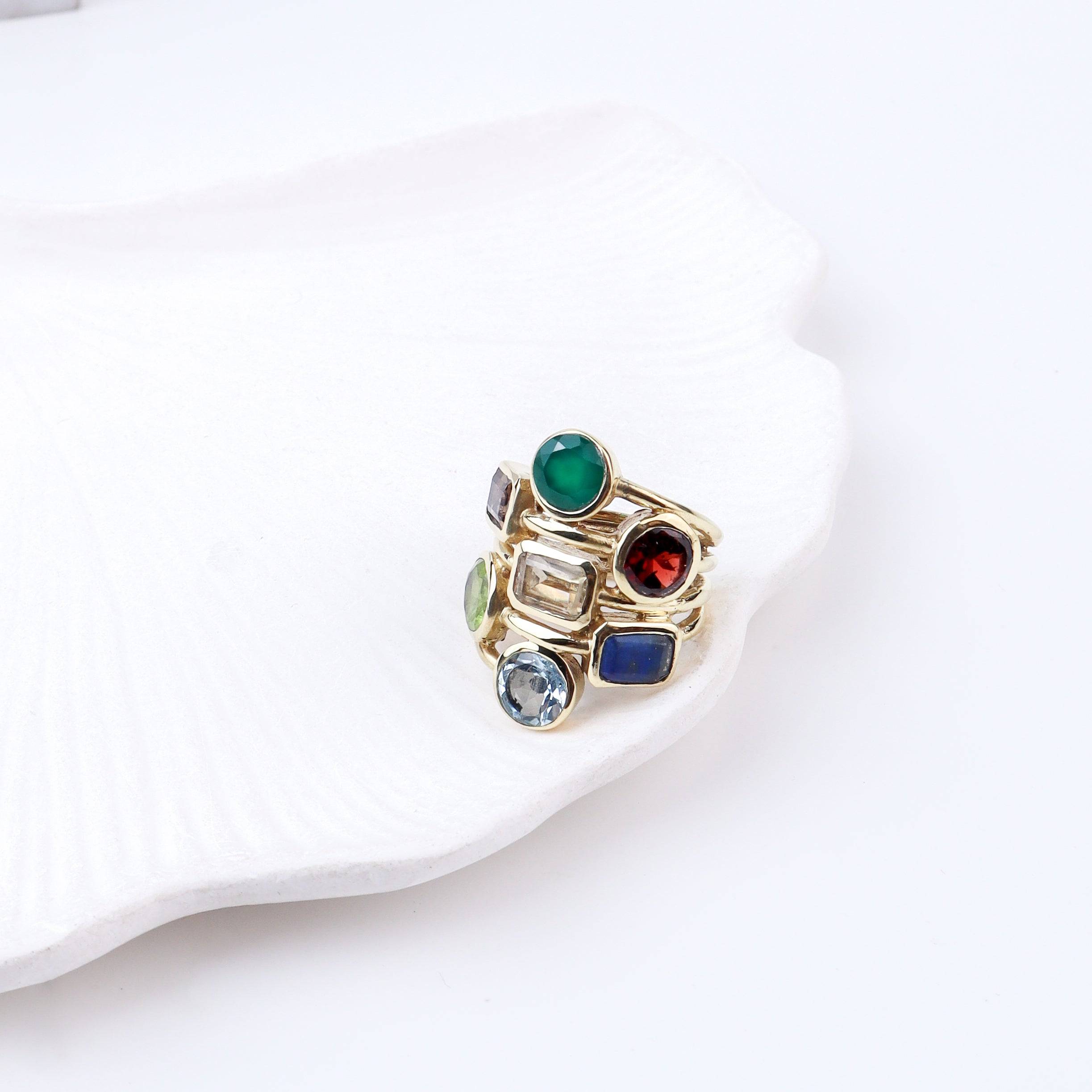 Flat-lay of Brass Fashion Ring with complementary jewellery and accessories for a chic styling setup