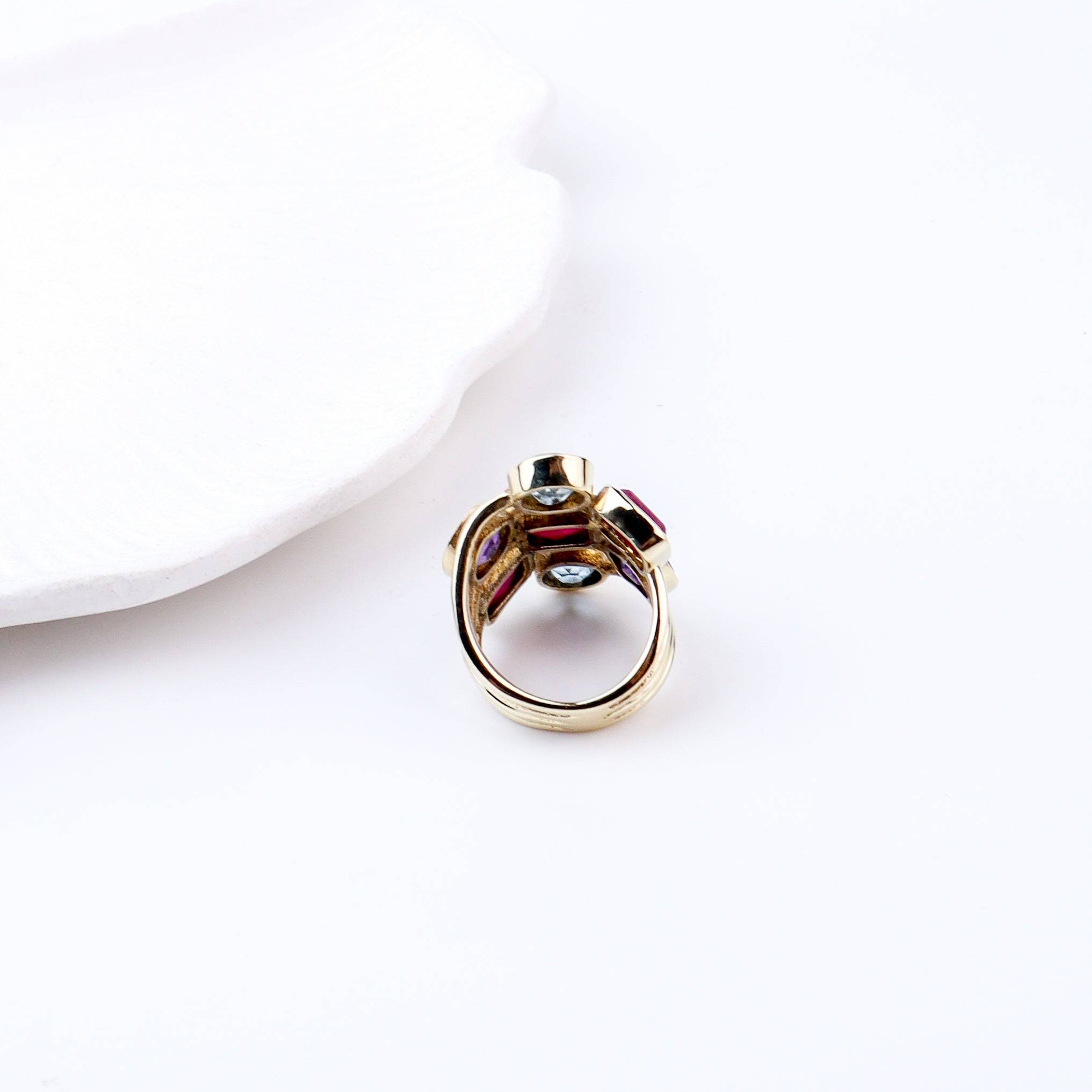 Flat-lay of Brass Fashion Ring with complementary jewellery and accessories for a chic styling setup
