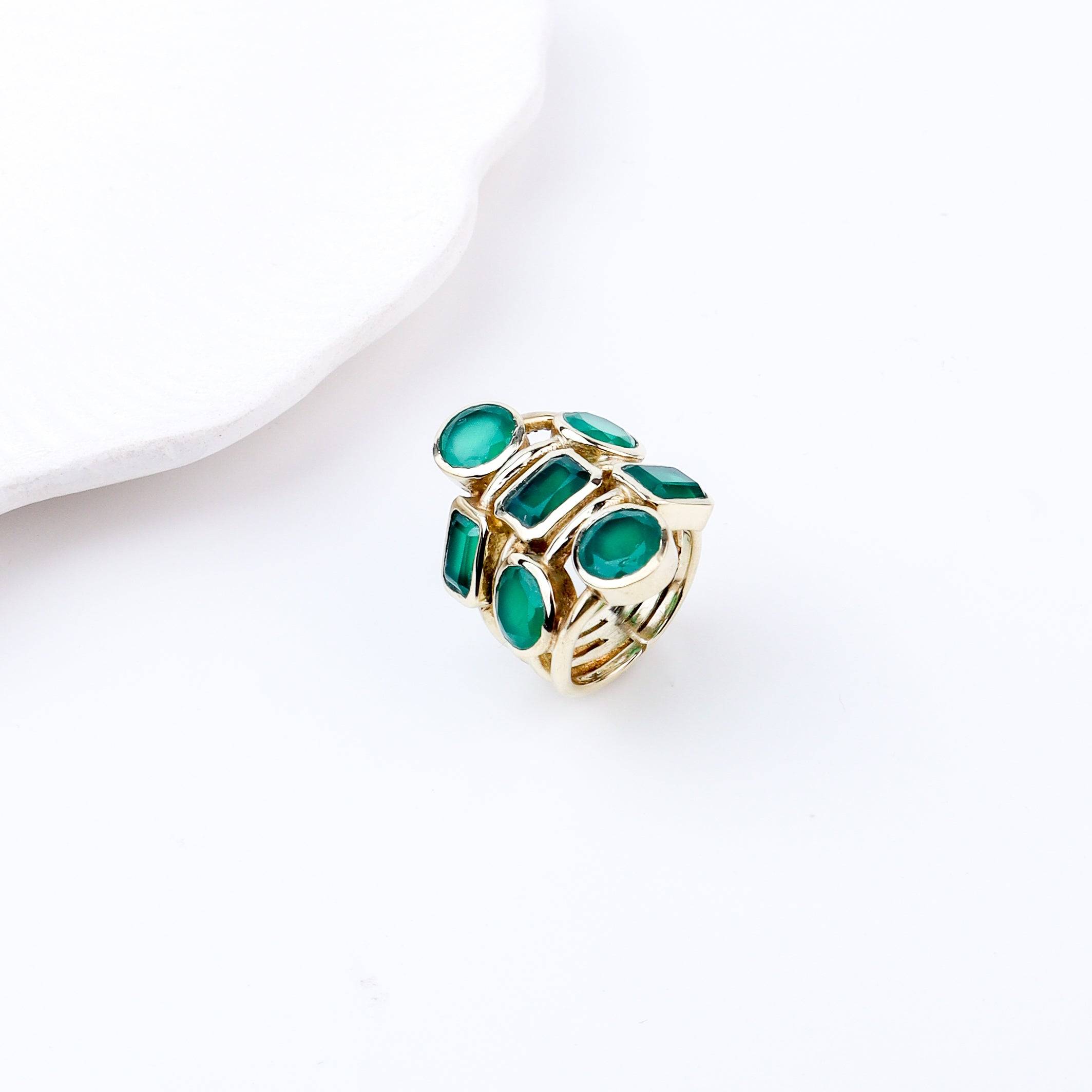 Detailed view of Brass Fashion Ring highlighting intricate motifs, textured surface, and refined brass finish