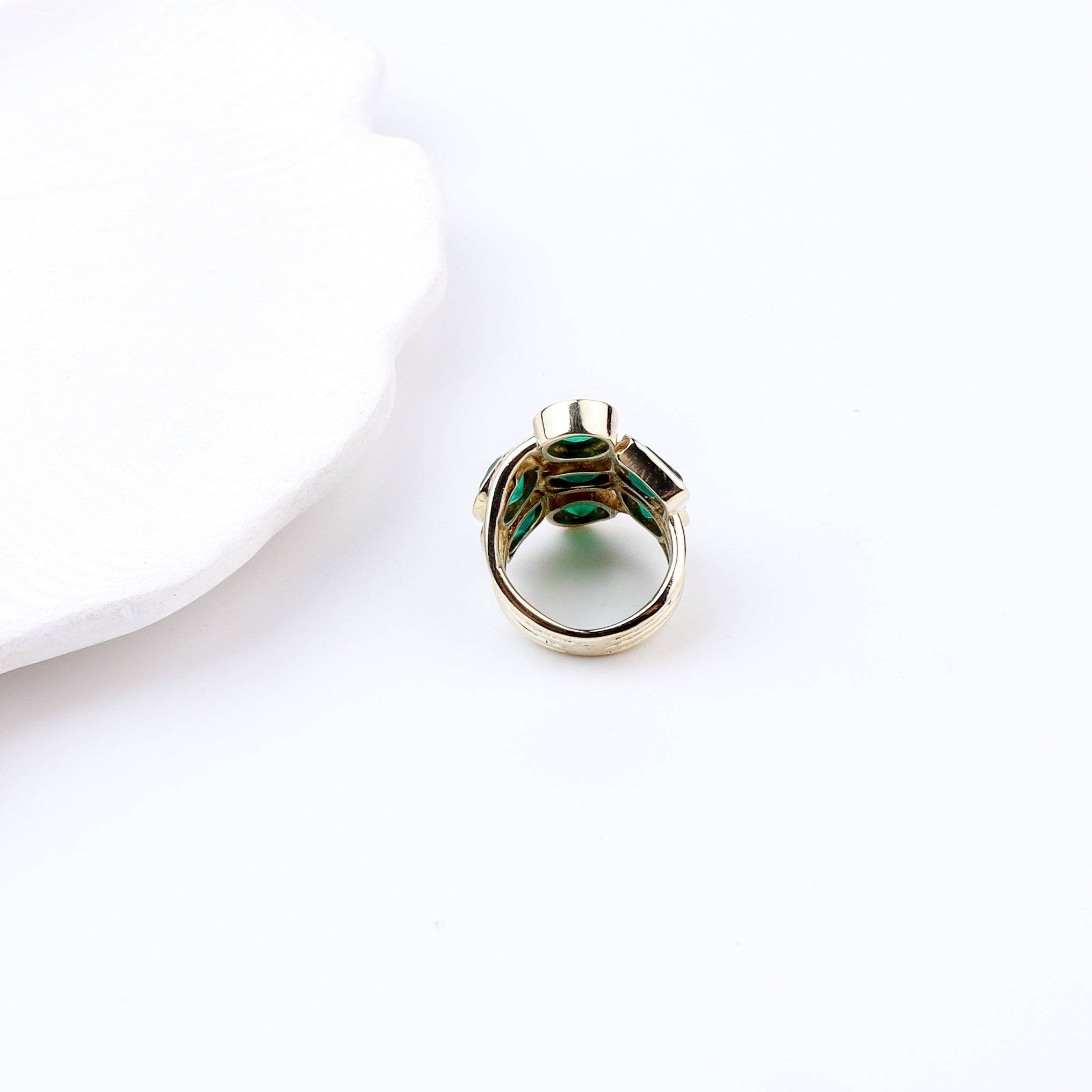 Angled view of Brass Fashion Ring highlighting its distinctive shape and polished brass finish