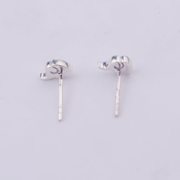 Silver elephant stud earrings on white surface