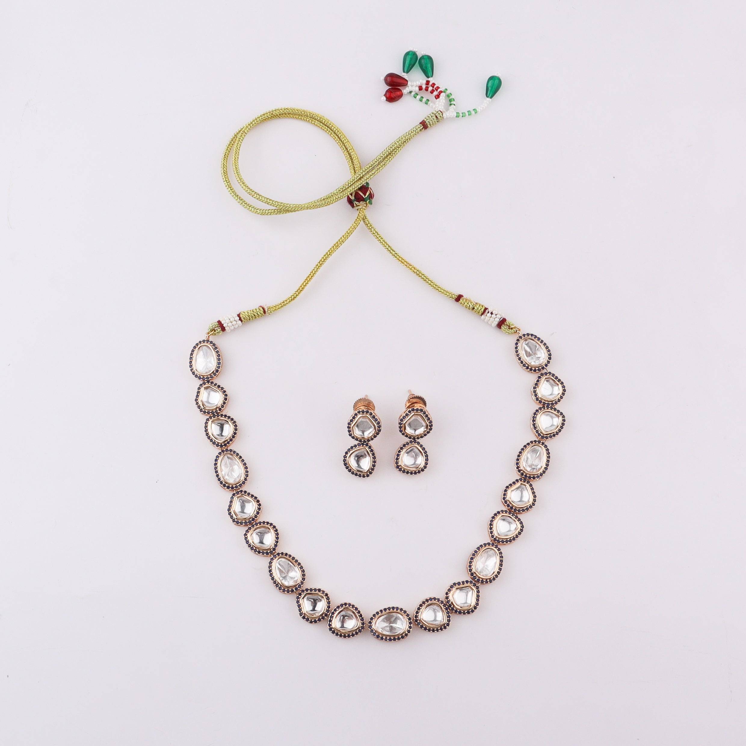 Detailed view of Brass Fashion Set highlighting intricate motifs, textured detailing, and refined brass finish