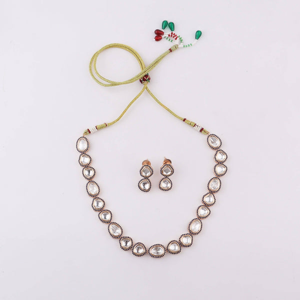 Detailed view of Brass Fashion Set highlighting intricate motifs, textured detailing, and refined brass finish