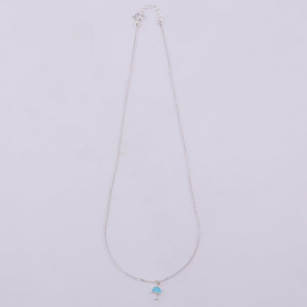 Close-up of silver umbrella pendant necklace with chain
