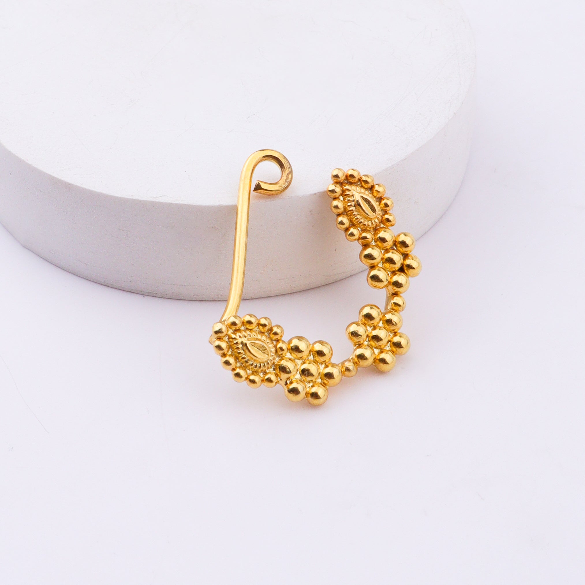 White background with Nath jewelry close-up