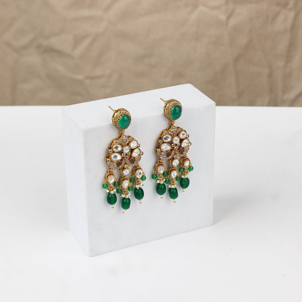 Detailed view of a 22K gold-plated fashion earring highlighting intricate motifs, textured detailing, and a premium 22K gold-plated finish