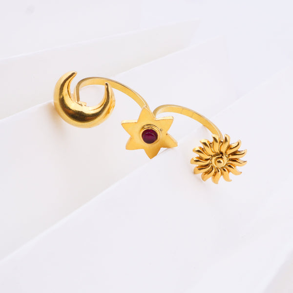 Gold moon and star rings on white background
