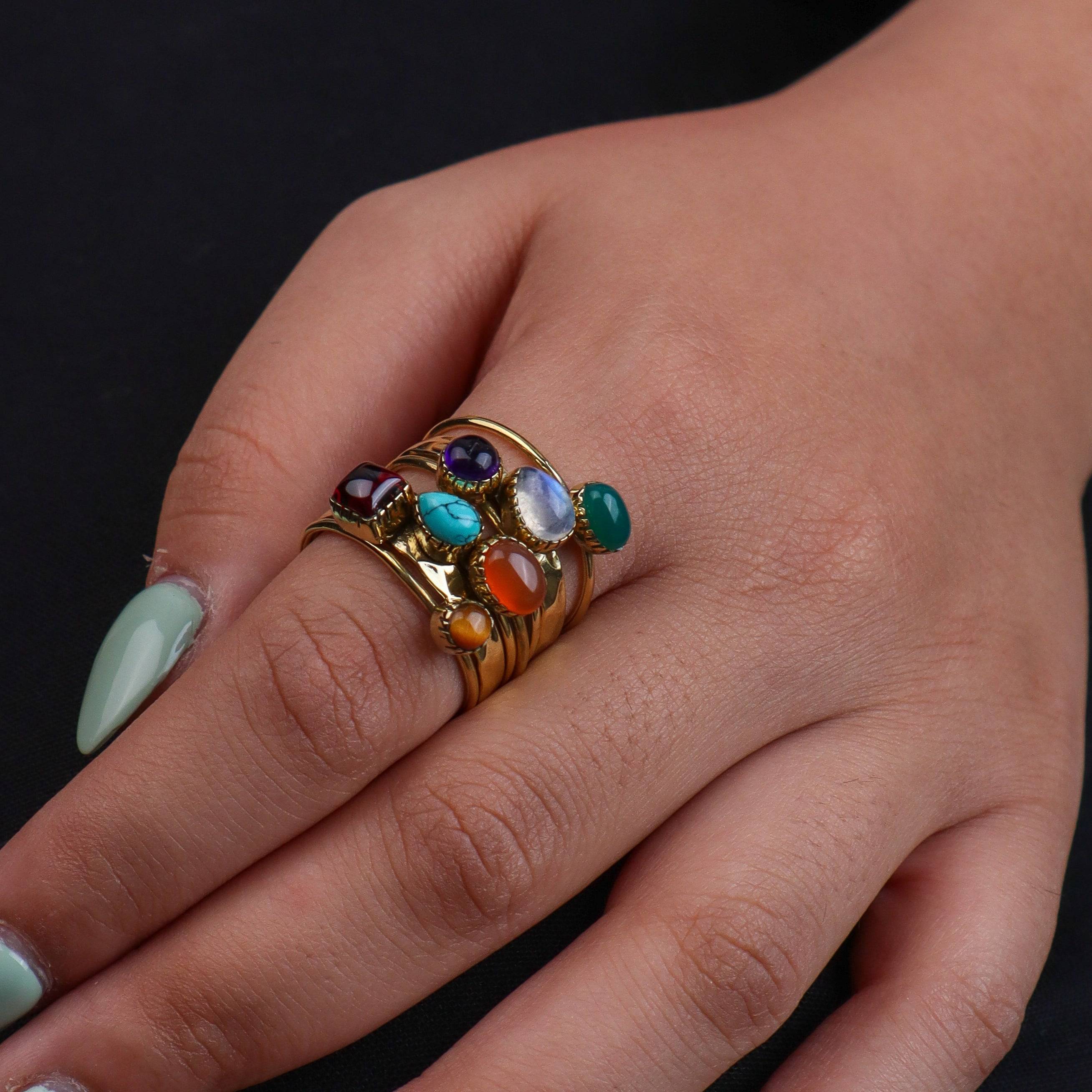 Model wearing a brass fashion ring for a stylish and contemporary fashion jewellery look