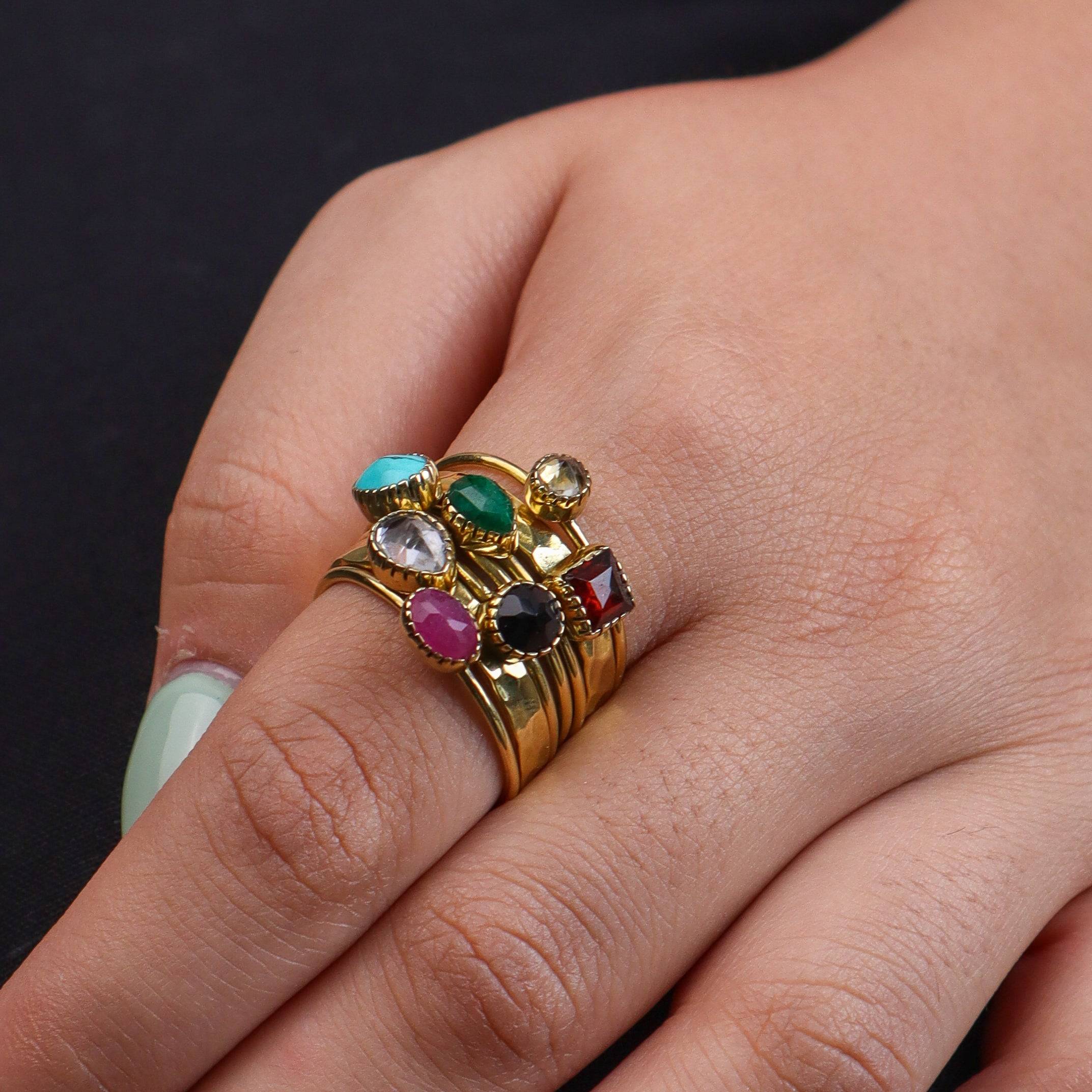 Model wearing a brass fashion ring for a stylish and contemporary fashion jewellery look