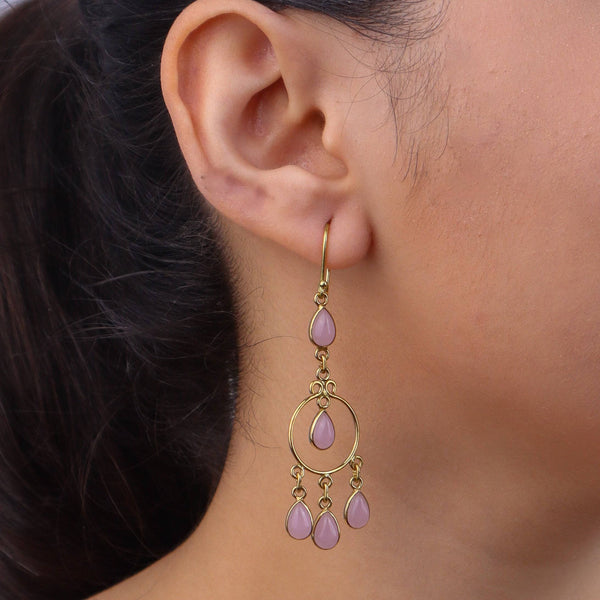 Model wearing brass fashion earrings for a stylish and contemporary fashion jewelry look