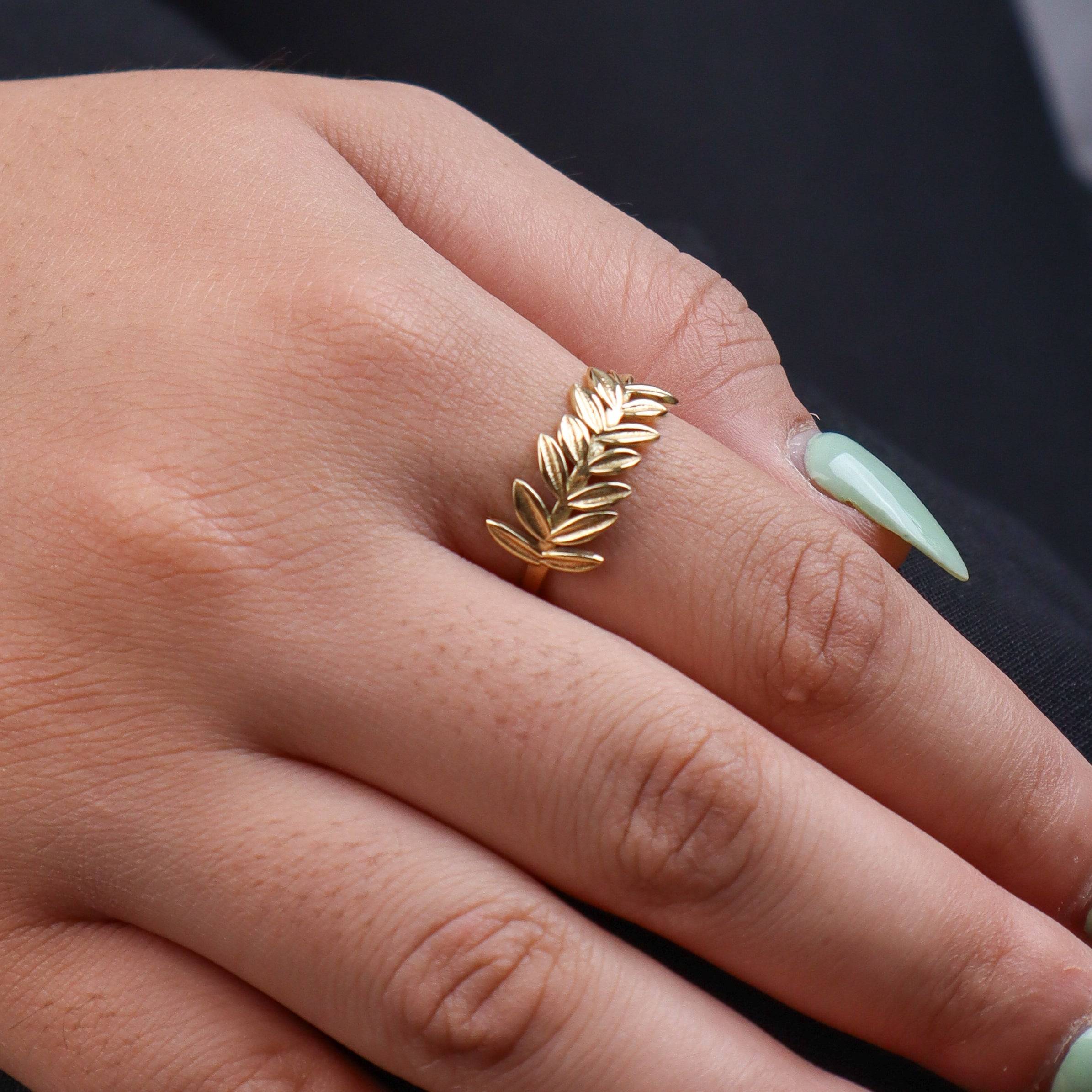 Model wearing a brass fashion ring for a stylish and contemporary fashion jewellery look