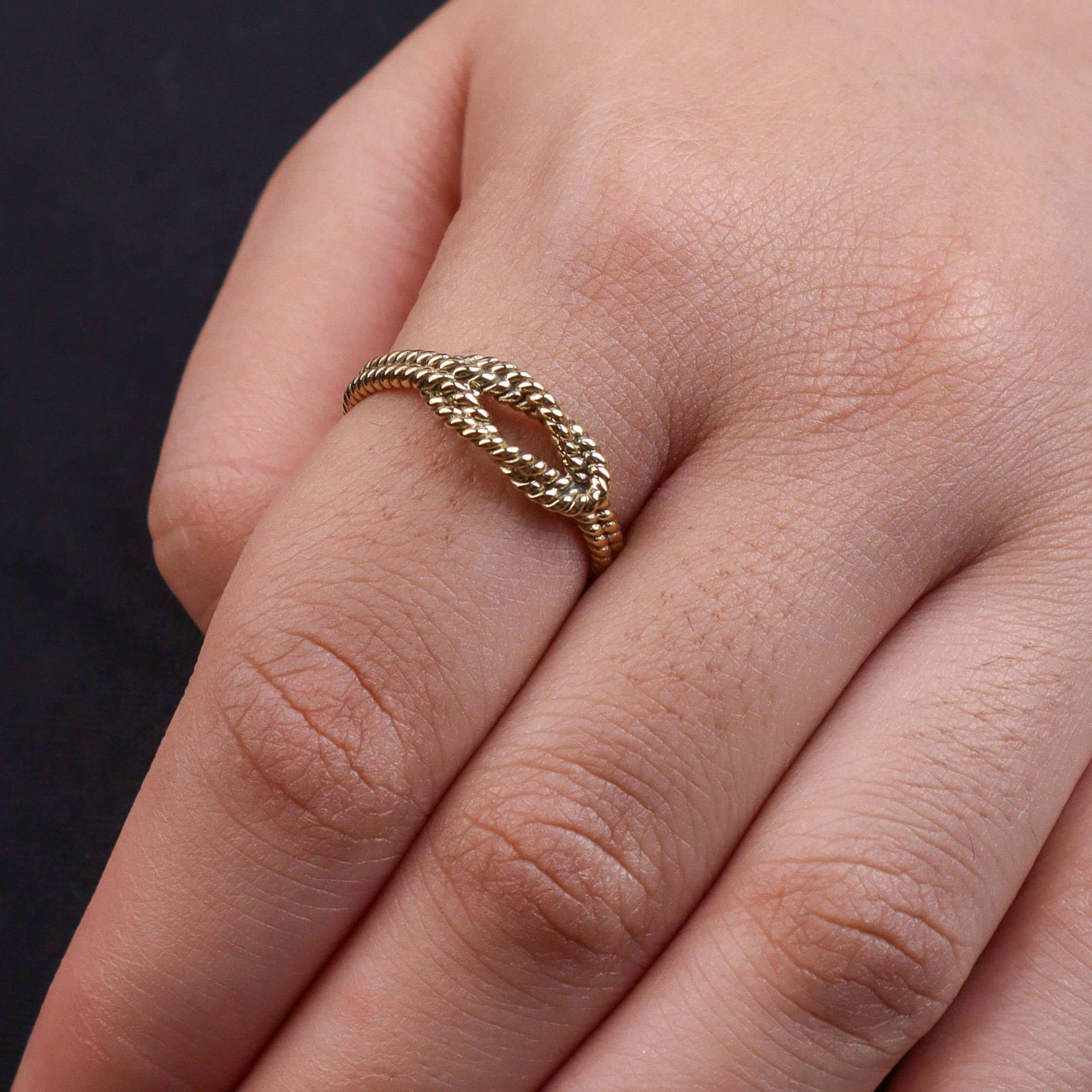 Model wearing a brass fashion ring for a stylish and contemporary fashion jewellery look