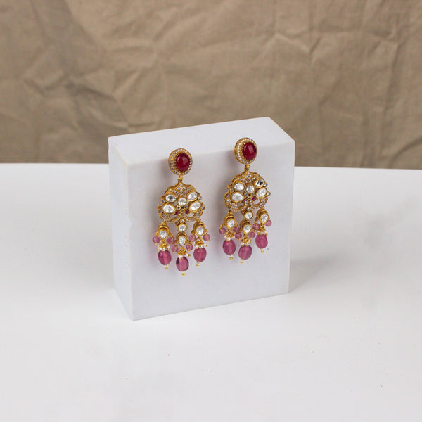 Detailed view of a 22K gold-plated fashion earring highlighting intricate motifs, textured detailing, and a premium 22K gold-plated finish
