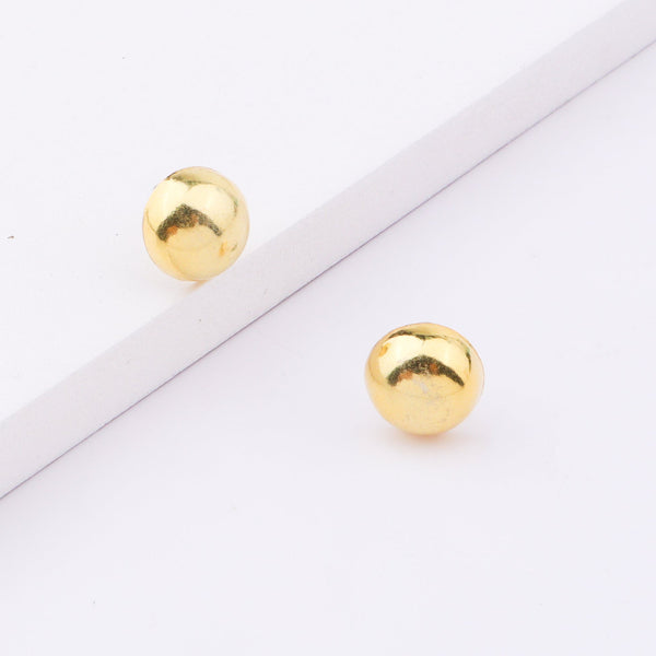 Gold dome earrings with reflective finish