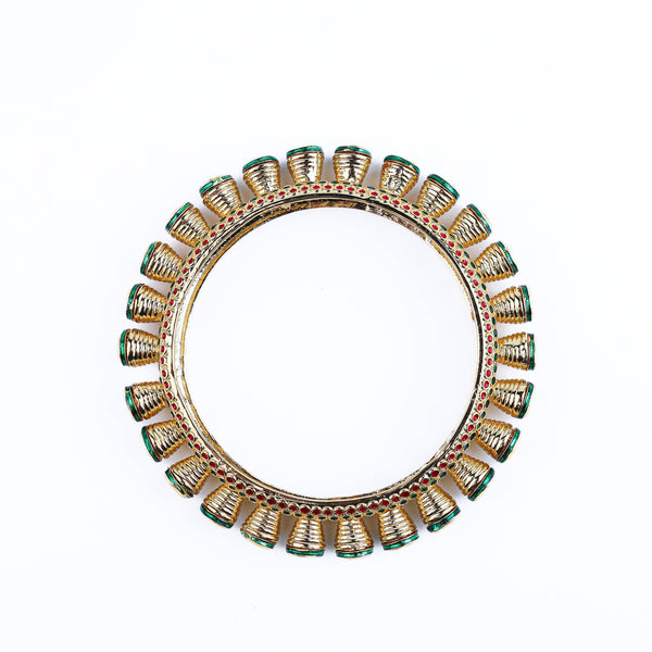 Detailed view of a 22K gold-plated fashion bangle (single) highlighting intricate motifs, textured detailing, and a premium 22K gold-plated finish