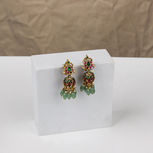 Close-up of a 22K gold-plated fashion earring showcasing intricate detailing, fine craftsmanship, and rich 22K gold plating