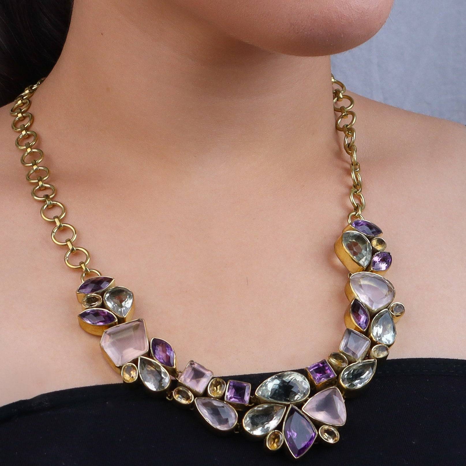 Model wearing a brass fashion necklace for a stylish and contemporary fashion jewellery look
