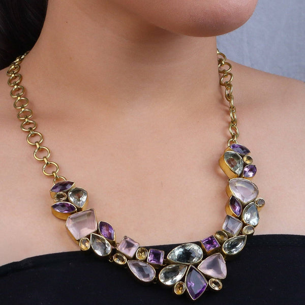 Model wearing a brass fashion necklace for a stylish and contemporary fashion jewellery look