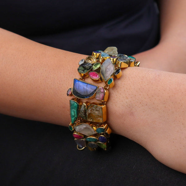 Model wearing a brass fashion bracelet for a stylish and contemporary fashion jewellery look