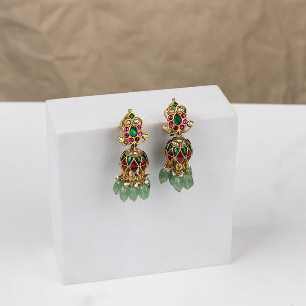 Detailed view of a 22K gold-plated fashion earring highlighting intricate motifs, textured detailing, and a premium 22K gold-plated finish