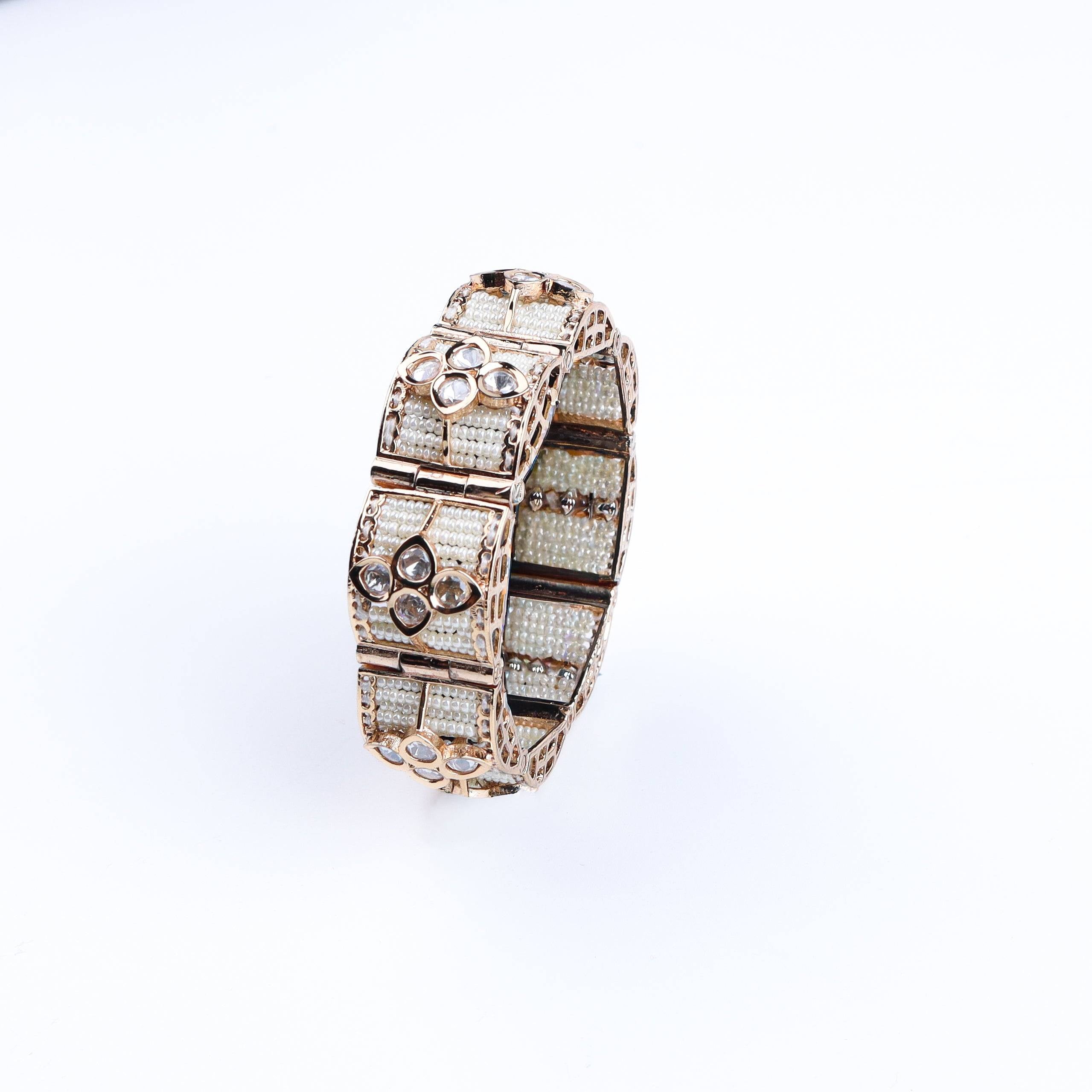 Detailed view of 22K gold-plated fashion bracelet highlighting intricate motifs, textured detailing, and premium 22K gold-plated finish