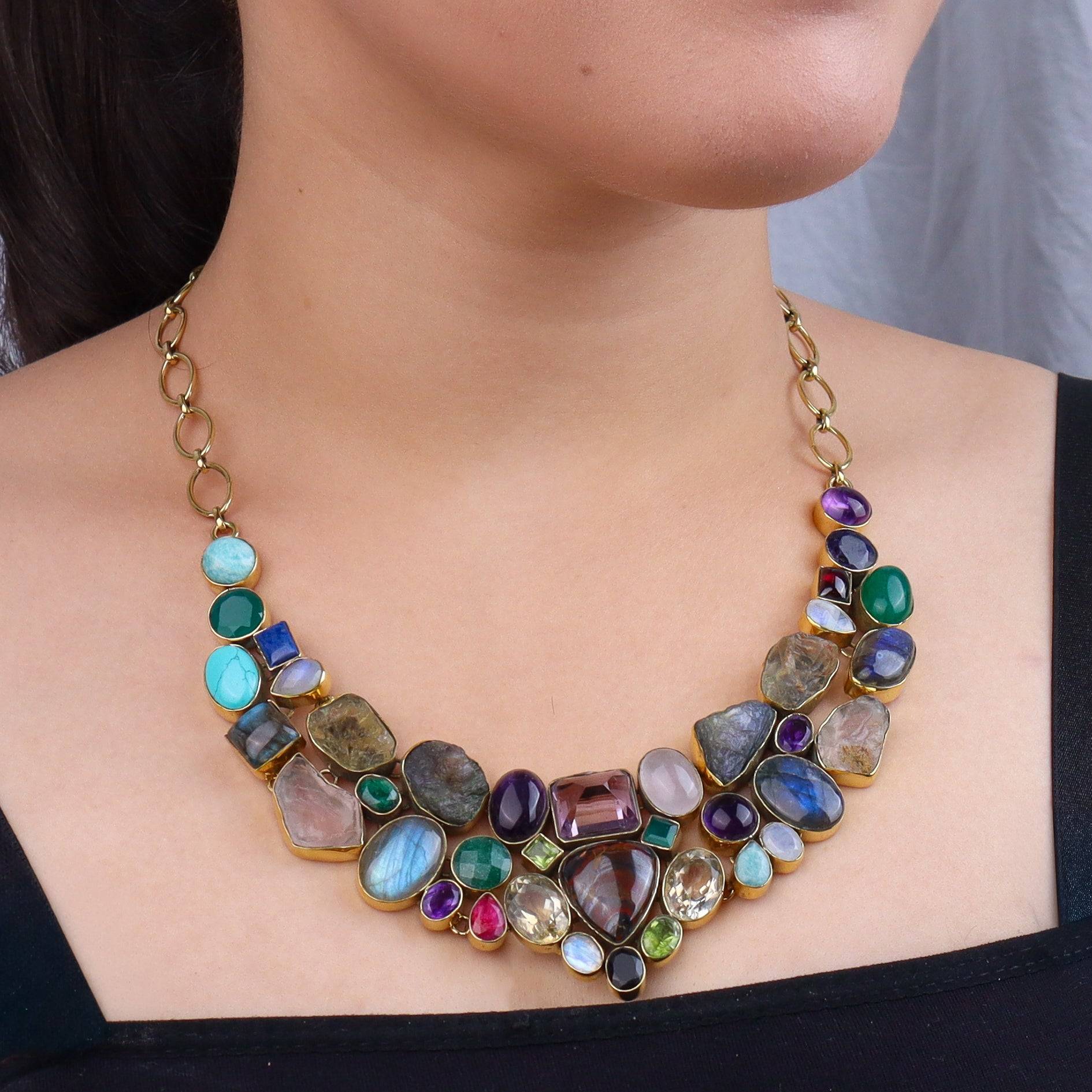 Model wearing a brass fashion necklace for a stylish and contemporary fashion jewellery look