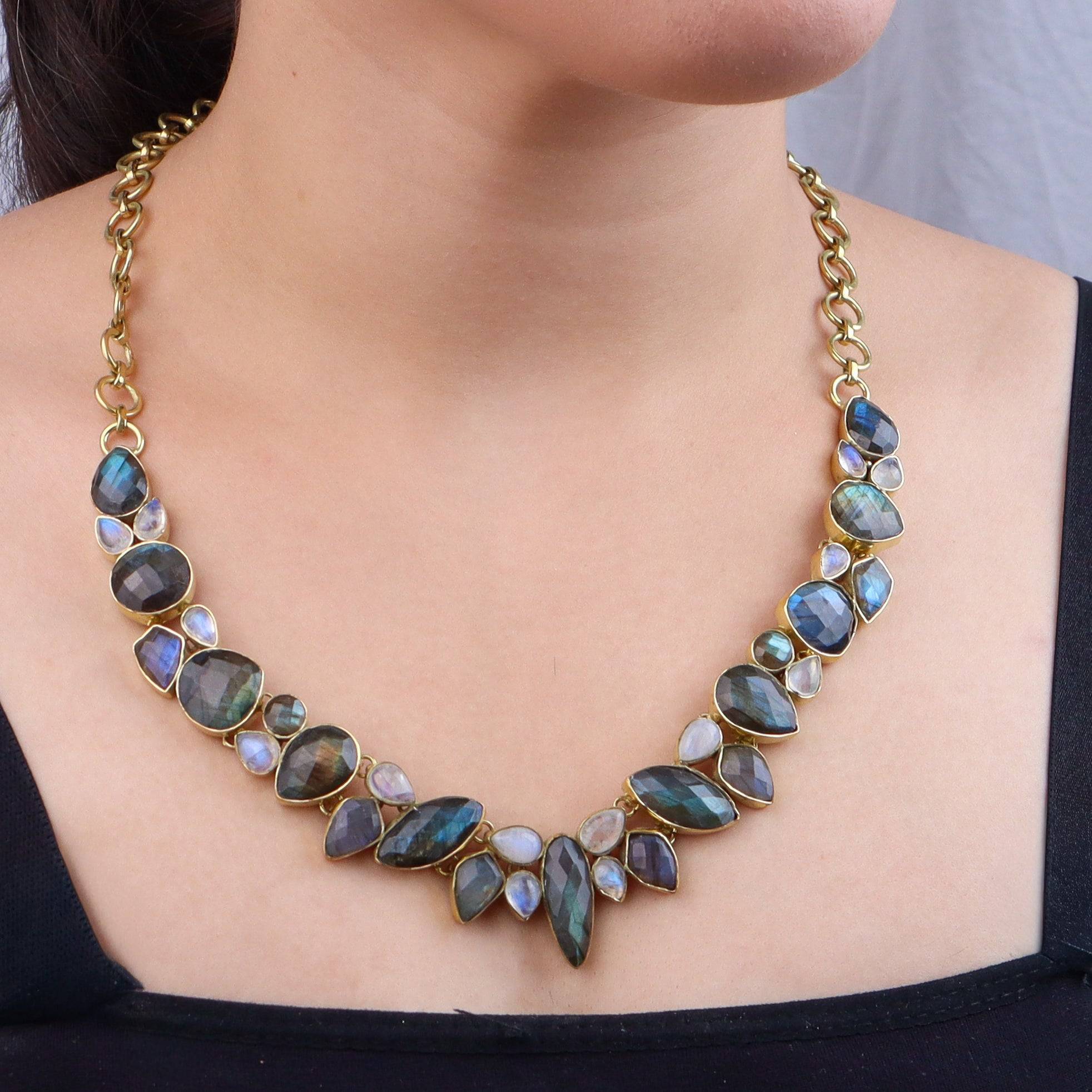 Model wearing a brass fashion necklace for a stylish and contemporary fashion jewellery look