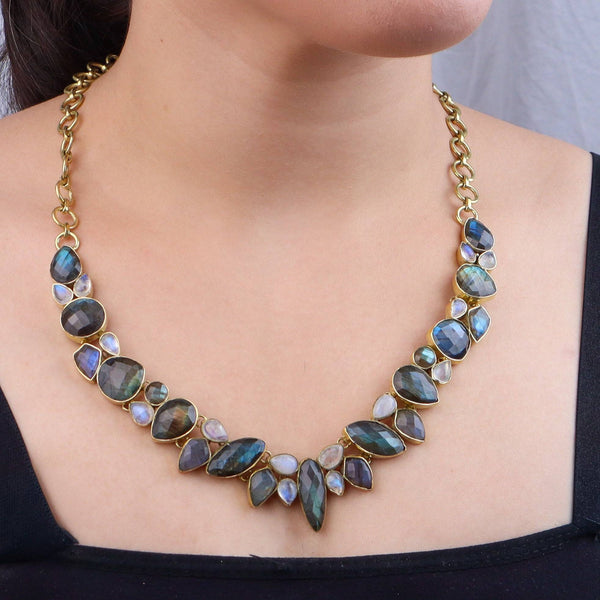 Model wearing a brass fashion necklace for a stylish and contemporary fashion jewellery look