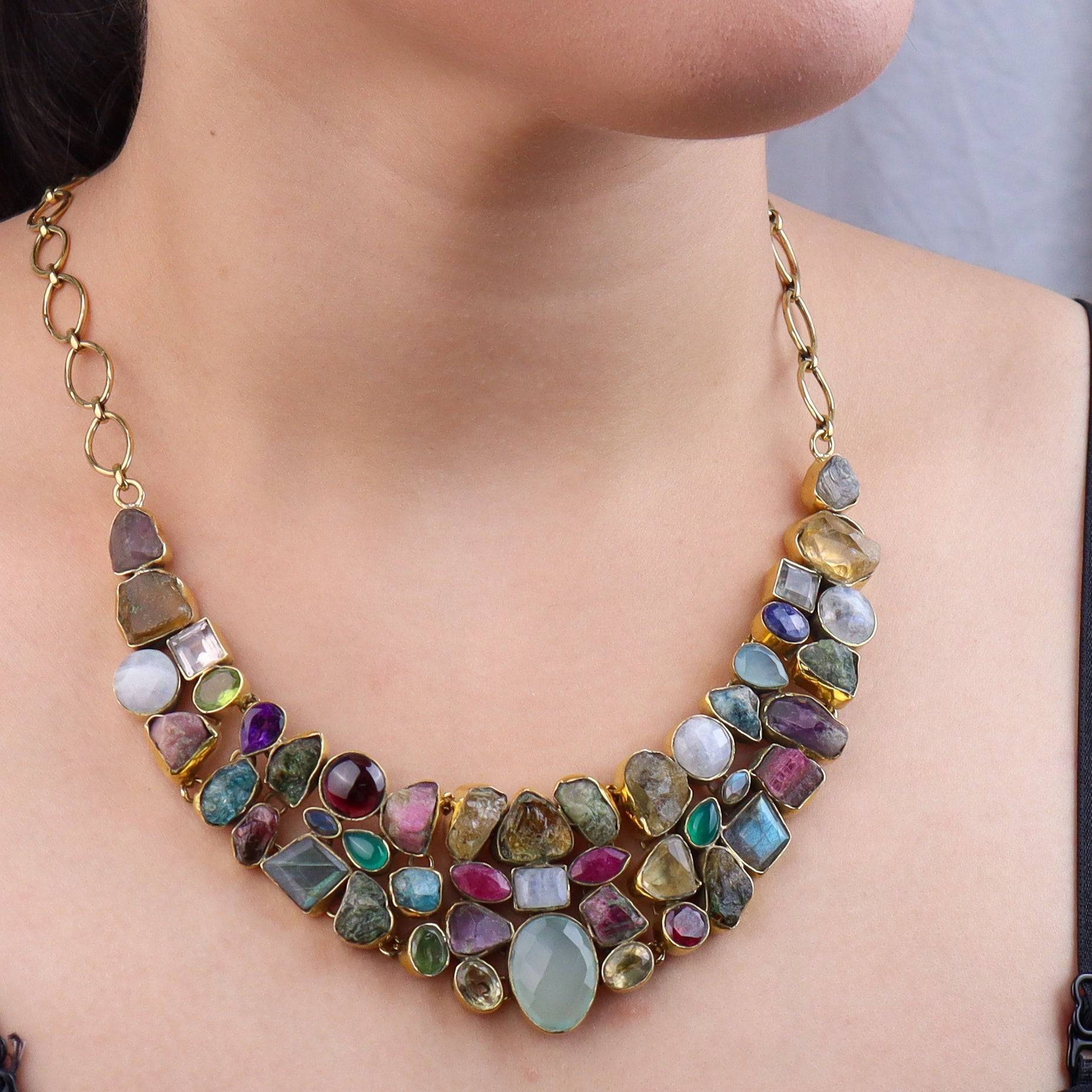 Model wearing a brass fashion necklace for a stylish and contemporary fashion jewellery look