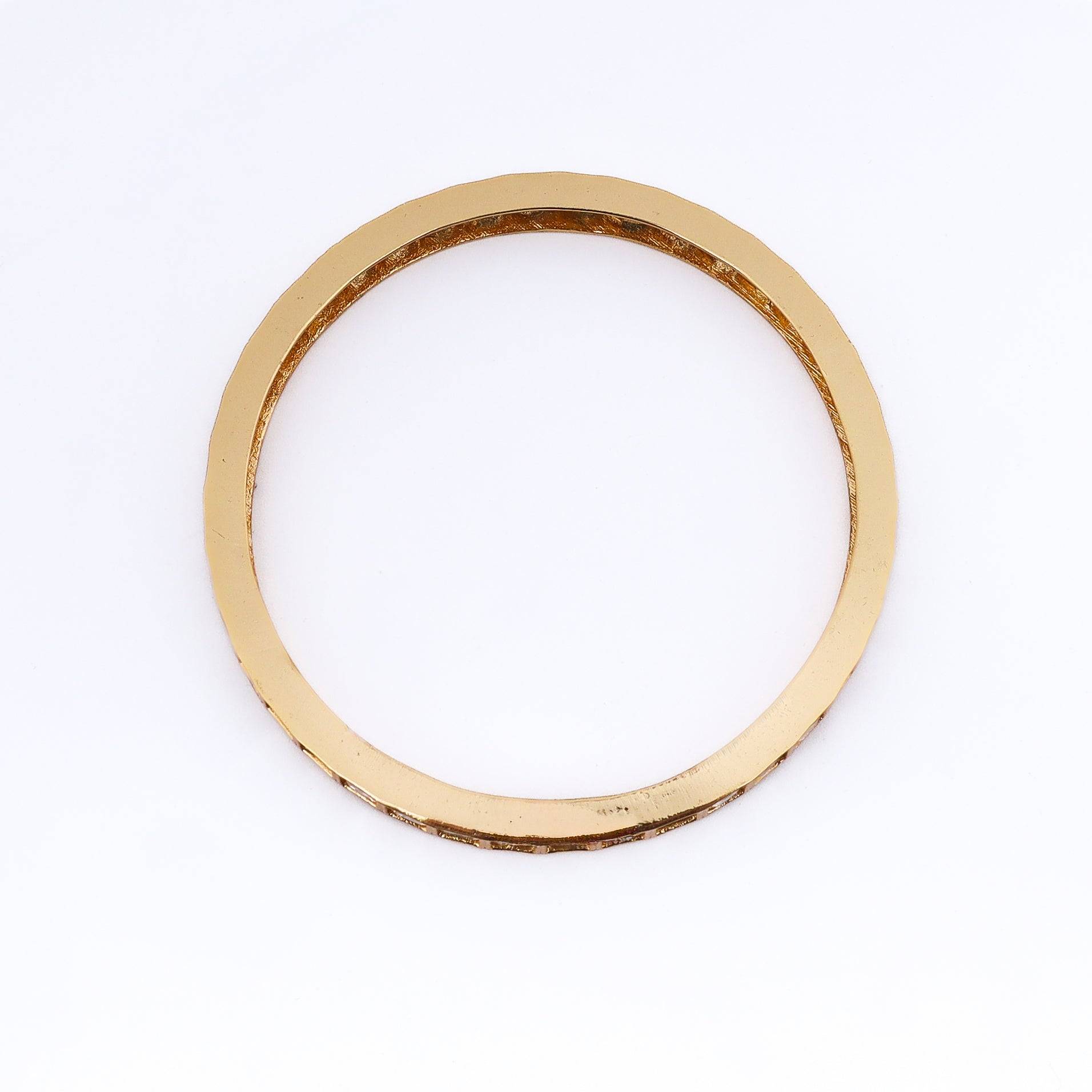 Detailed view of a 22K gold-plated fashion bangle (single) highlighting intricate motifs, textured detailing, and premium 22K gold plating