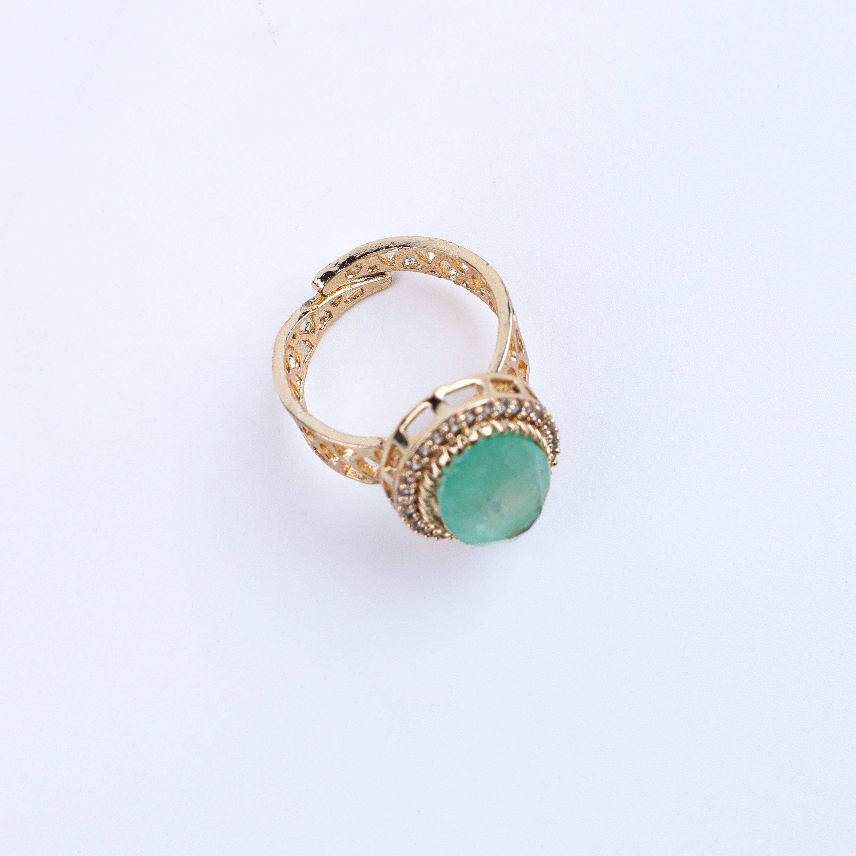 Angled view of a 22K gold-plated fashion ring highlighting its elegant shape, structure, and polished gold finish