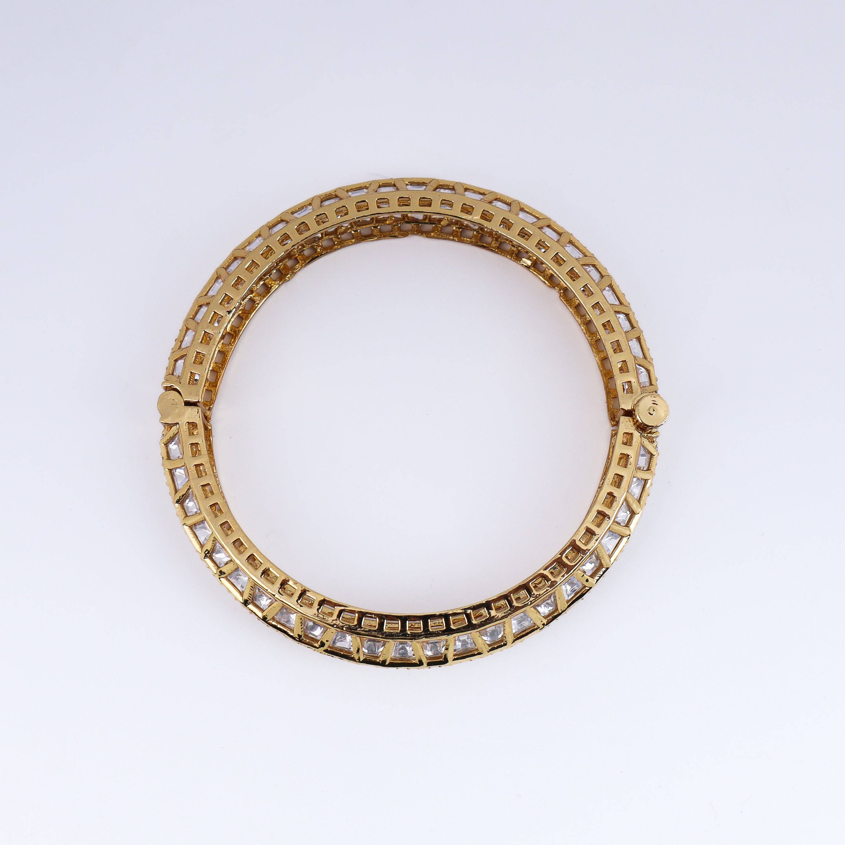 Detailed view of a 22K gold-plated fashion bangle (single) highlighting intricate motifs, textured detailing, and a premium 22K gold-plated finish