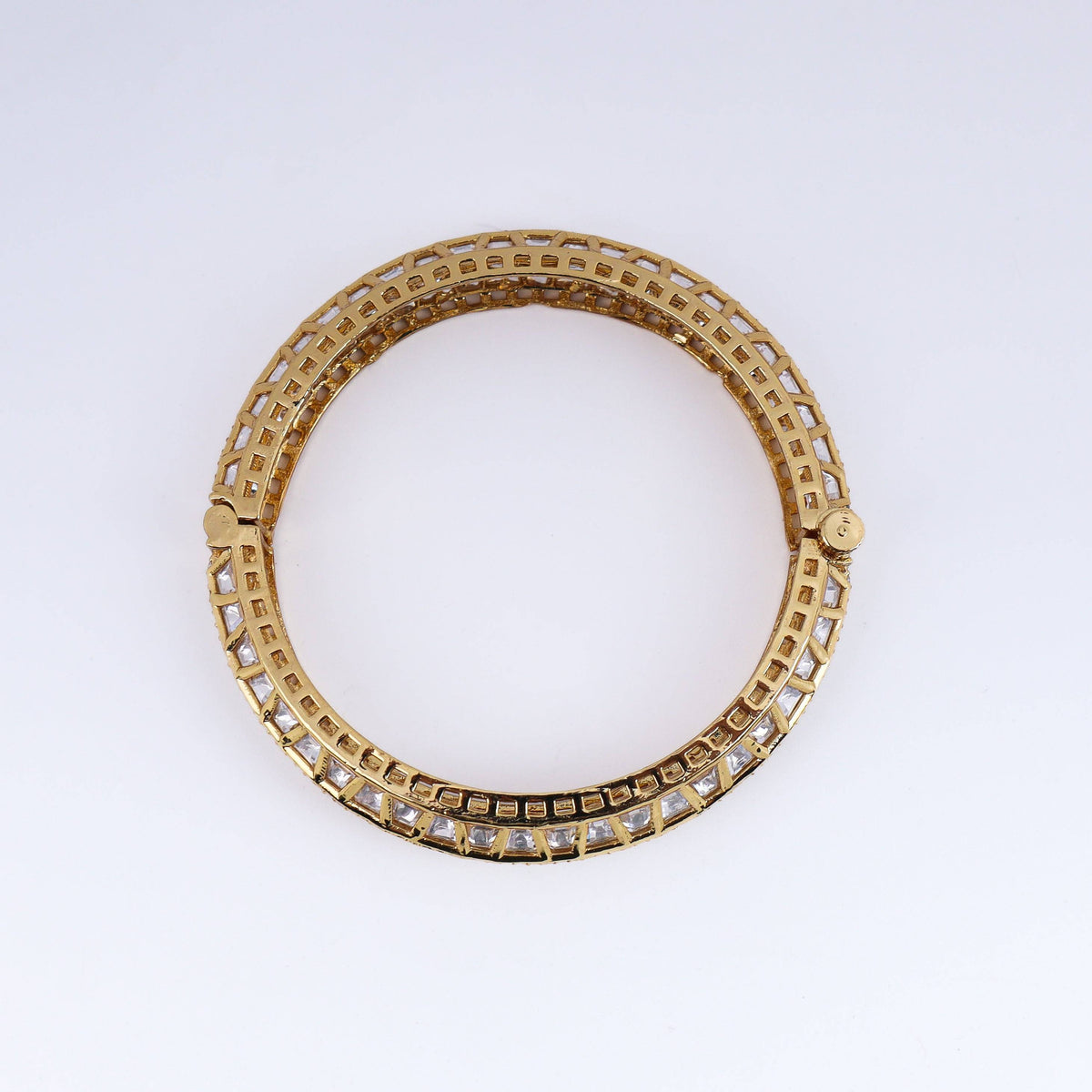 Detailed view of a 22K gold-plated fashion bangle (single) highlighting intricate motifs, textured detailing, and a premium 22K gold-plated finish
