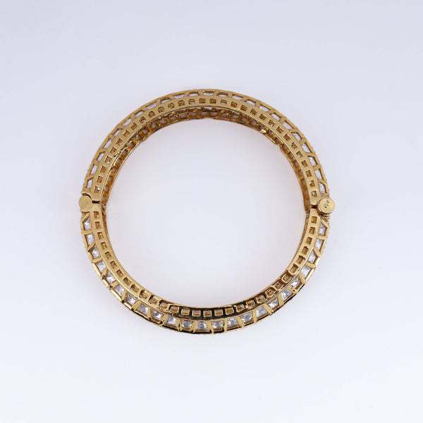 Detailed view of a 22K gold-plated fashion bangle (single) highlighting intricate motifs, textured detailing, and a premium 22K gold-plated finish