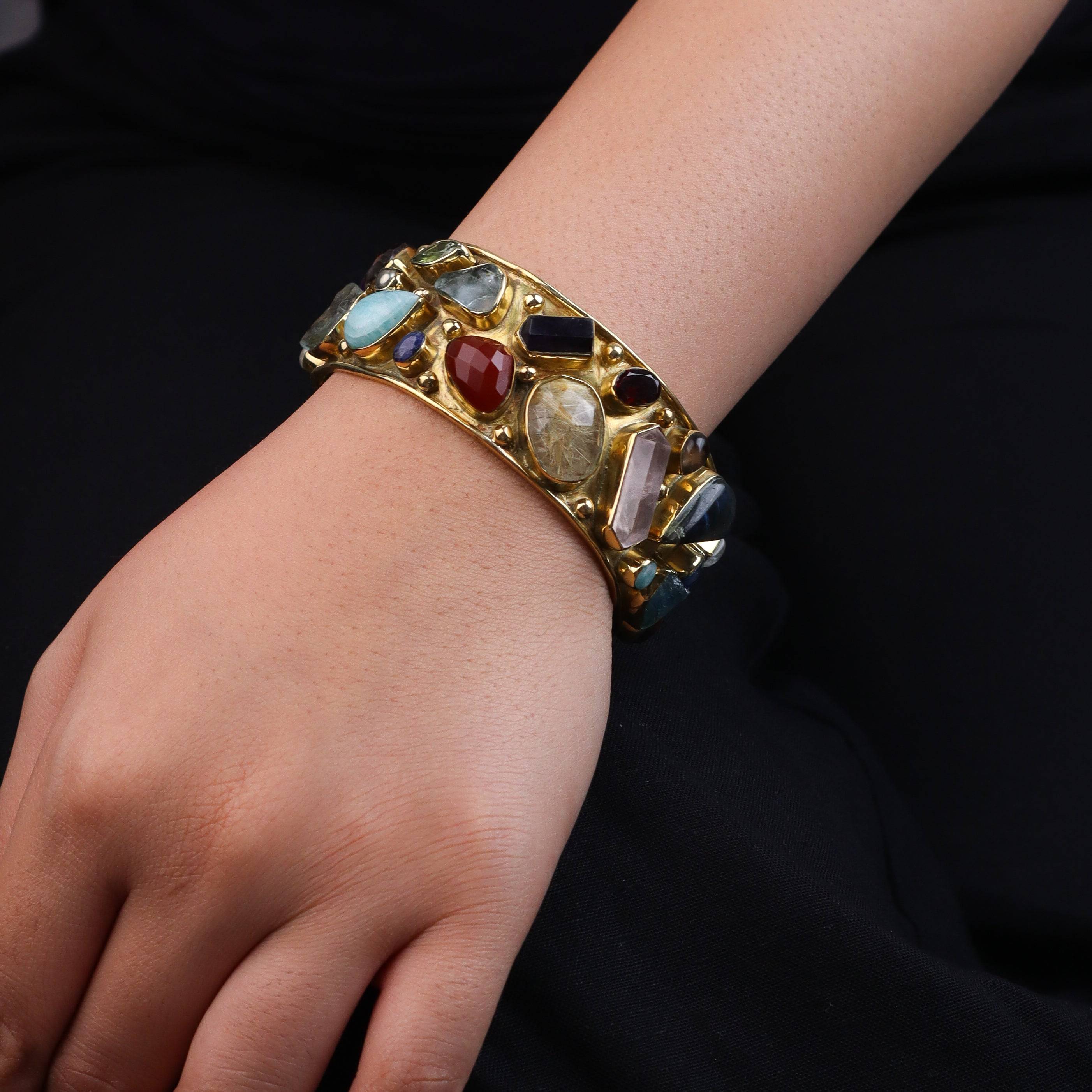 Model wearing a brass fashion bracelet for a stylish and contemporary fashion jewellery look