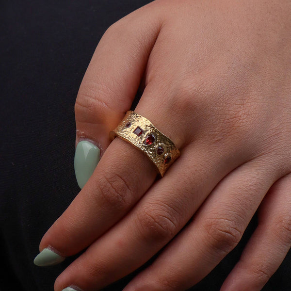 Model wearing a brass fashion ring for a stylish and contemporary fashion jewellery look