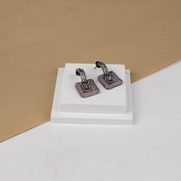 Angled view of Fashion Earring highlighting its unique silhouette, structure, and polished finish