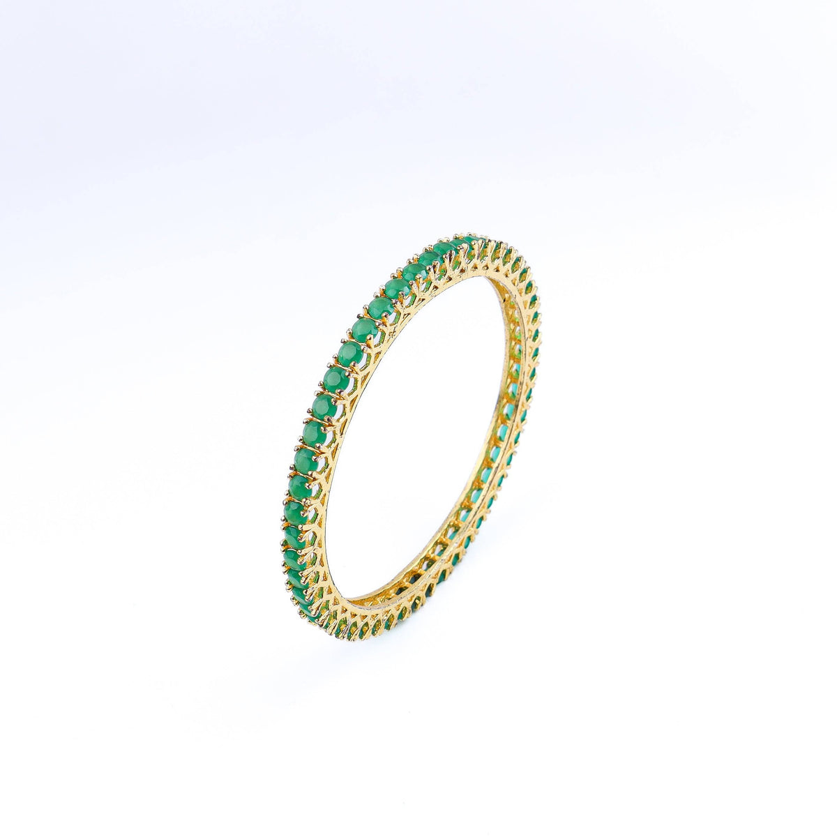 Angled view of a 22K gold-plated fashion bangle (single) highlighting its elegant structure and polished gold finish