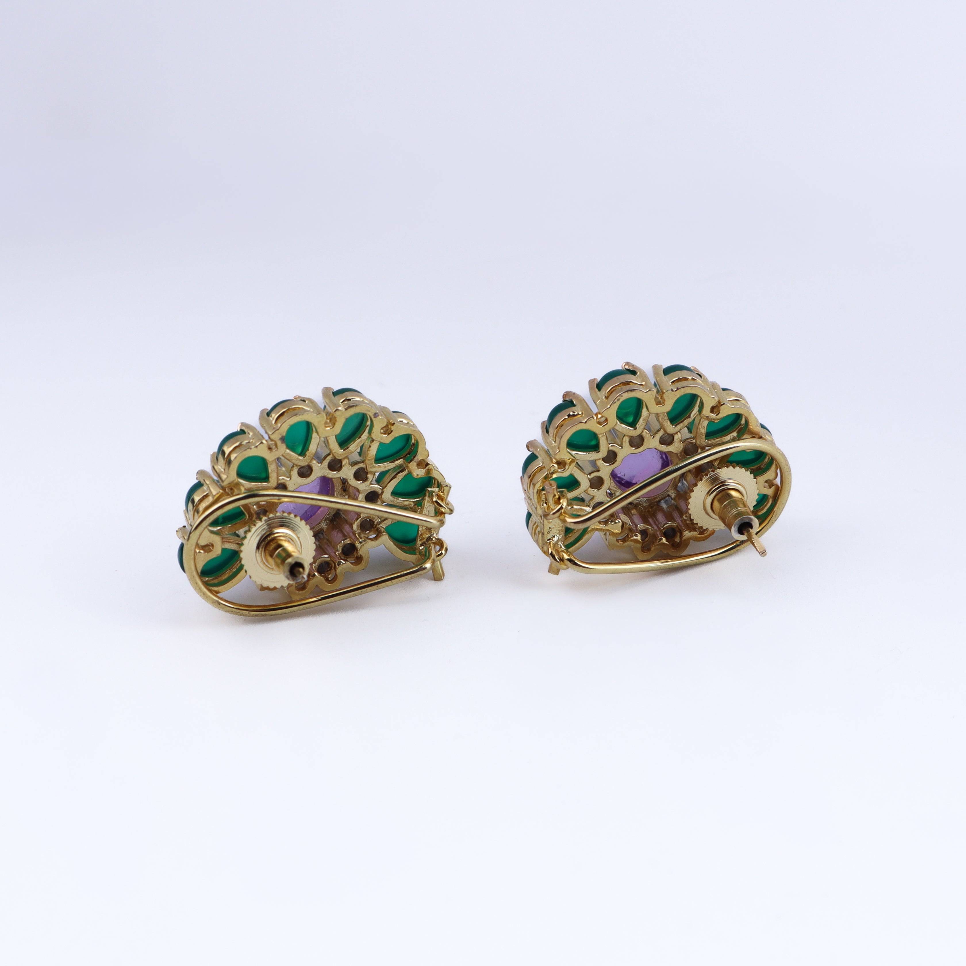 Angled view of a 22K gold-plated fashion earring highlighting its elegant silhouette, structure, and polished gold finish