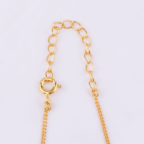 Gold chain with circular clasp