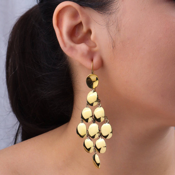 Model wearing brass fashion earrings for a stylish and contemporary fashion jewelry look