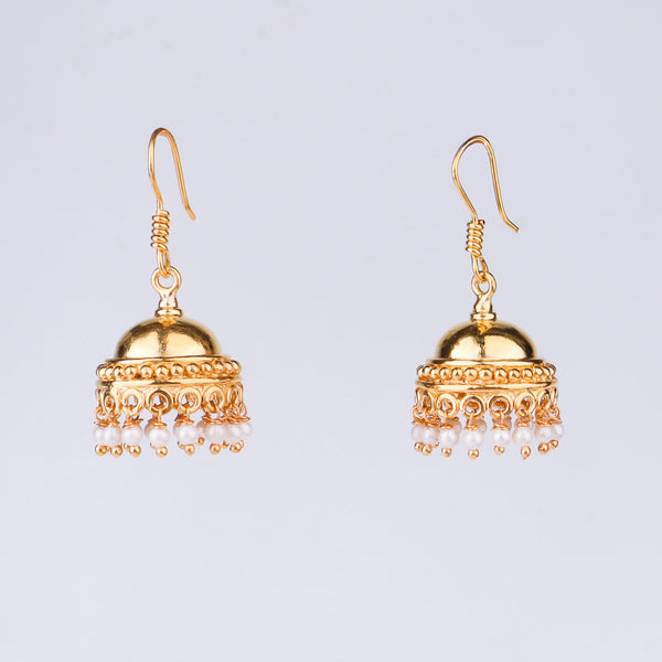 Gold earrings with pearl drops and detailed craftsmanship